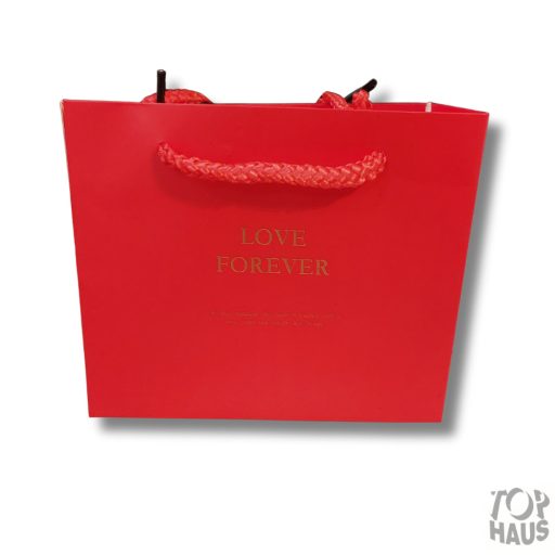 Piros papír ajándék tartó táska
